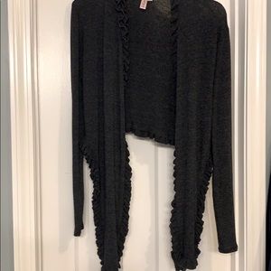 Fun dark gray ruffle tailed sweater.